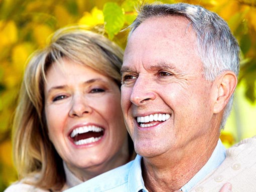 elderly couple smiling